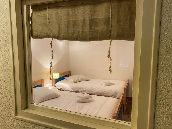 Appart'Hôtel LIDO au bord de l'eau : photo 4 de la chambre appartement 2 chambres - côté forêt