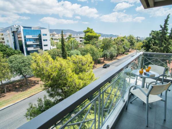 Palmyra Beach Hotel : photo 4 de la chambre chambre double ou lits jumeaux standard avec vue partielle sur mer