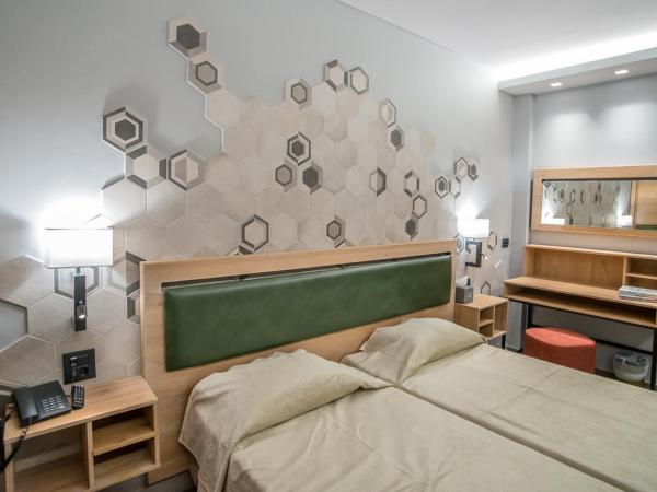 Palmyra Beach Hotel : photo 3 de la chambre chambre familiale de luxe deux chambres