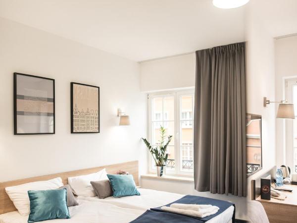 Fama Residence Gdańsk Old Town : photo 8 de la chambre chambre deluxe double ou lits jumeaux