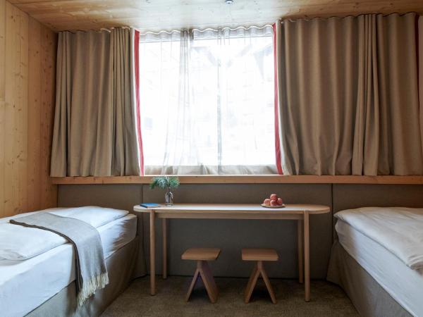 Carina - Design&Lifestyle hotel : photo 1 de la chambre chambre lits jumeaux pour personnes à mobilité réduite