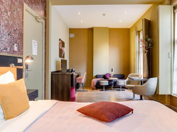 Brasss Hotel Suites : photo 4 de la chambre suite exécutive goudbrasem