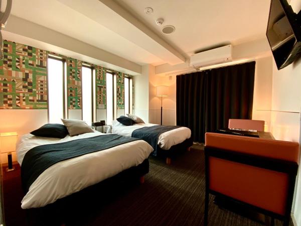 Residence Condominium KALAHAAI : photo 2 de la chambre chambre lits jumeaux deluxe