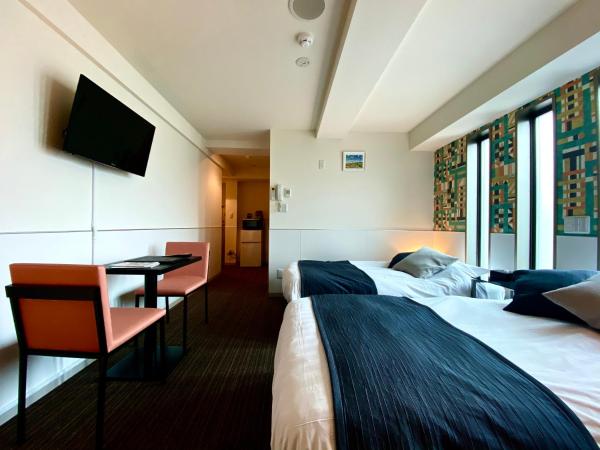 Residence Condominium KALAHAAI : photo 3 de la chambre chambre lits jumeaux deluxe