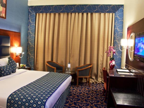 Ramee Rose Hotel : photo 10 de la chambre suite exécutive royale