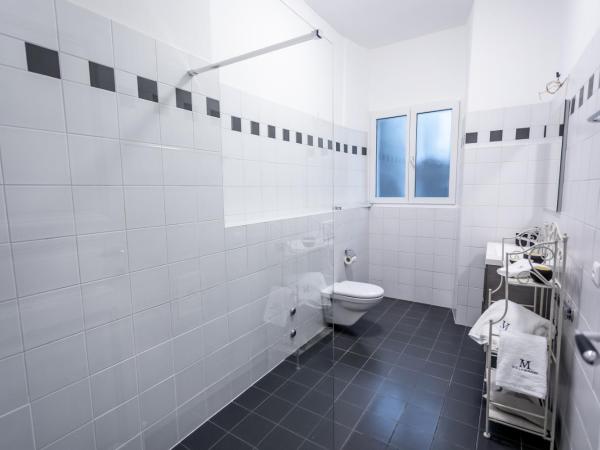 Villa Muralto Rooms & Garden : photo 7 de la chambre suite familiale deluxe