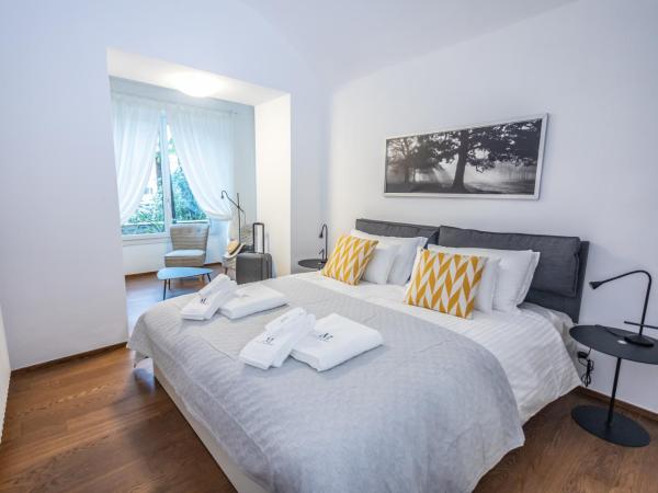 Villa Muralto Rooms & Garden : photo 4 de la chambre suite familiale deluxe