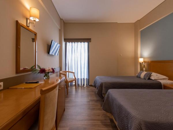 Hotel Ostria : photo 3 de la chambre chambre quadruple avec balcon