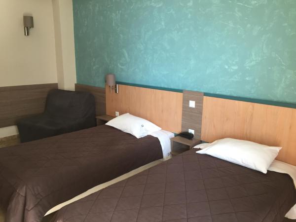 Hotel Ostria : photo 5 de la chambre chambre quadruple avec balcon