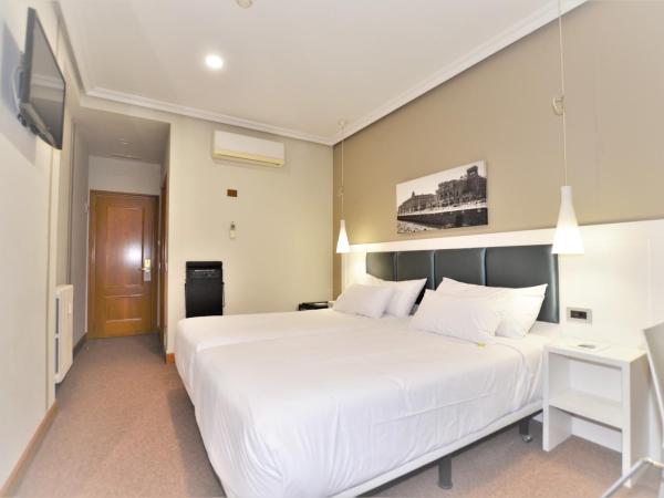 Pensión Alemana : photo 2 de la chambre chambre double ou lits jumeaux