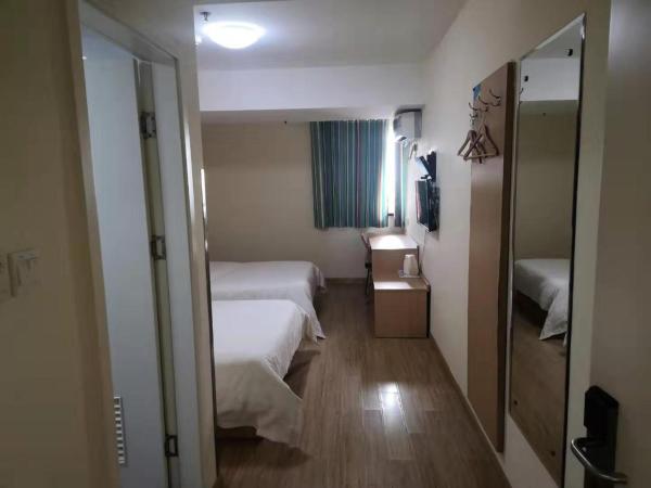 7Days Inn Suzhou Xuguan : photo 2 de la chambre chambre lits jumeaux confortable