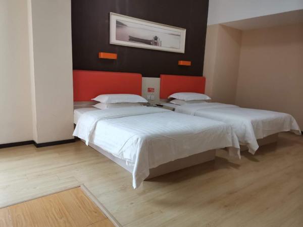 7Days Premium Dalian Airport : photo 5 de la chambre chambre lits jumeaux de luxe premium