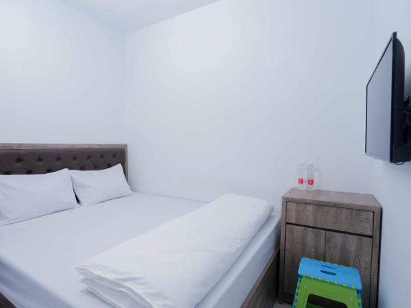 Amethyst cengkareng syariah : photo 1 de la chambre chambre double deluxe