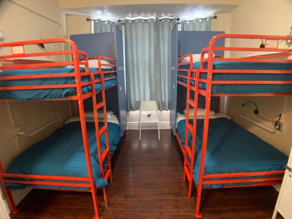 Orange Village Hostel : photo 6 de la chambre lit simple dans dortoir pour hommes - salle de bains privative