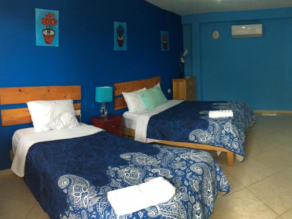 Mansion Giahn Bed & Breakfast : photo 3 de la chambre chambre triple Économique