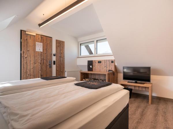 BinderS Budget City-Mountain Hotel : photo 1 de la chambre suite junior