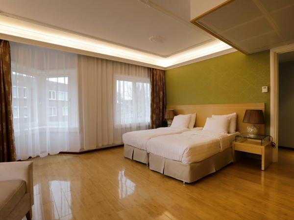 Chasse Hotel : photo 3 de la chambre chambre lits jumeaux deluxe