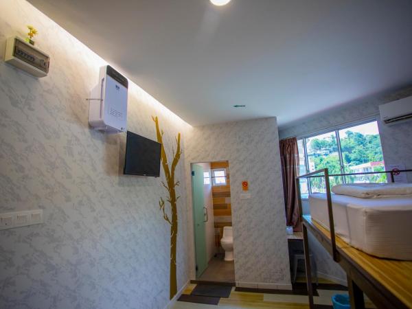 Lazy Cat Home At Gaya Street : photo 1 de la chambre chambre familiale avec salle de bains privative