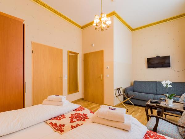 Parlamento Rooms : photo 2 de la chambre chambre familiale adaptée aux personnes à mobilité réduite