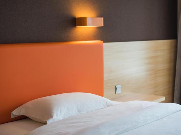 7Days Premium Chongqing Baishiyi Hot Spring Capital Branch : photo 3 de la chambre chambre supérieure lit queen-size