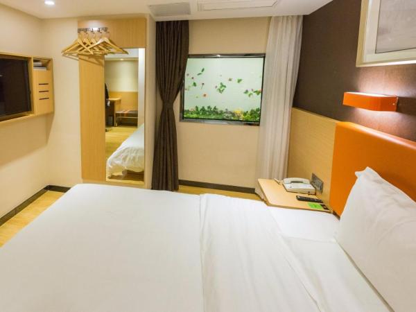 7Days Premium Chongqing Jiangbei International Airport Lushan Light Rail Station Branch : photo 5 de la chambre chambre double