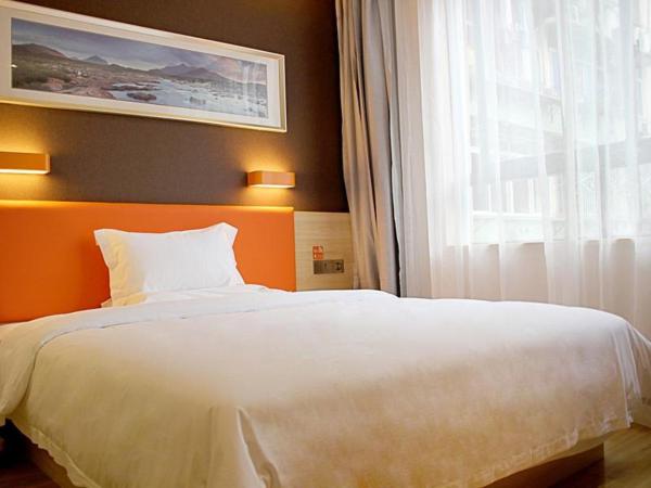 7Days Premium Chongqing Nanping Pedestrian Street Light Rail Station Branch : photo 1 de la chambre chambre lit king-size