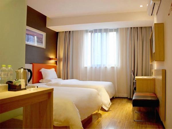 7Days Premium Chongqing Nanping Pedestrian Street Light Rail Station Branch : photo 3 de la chambre chambre lits jumeaux supérieure