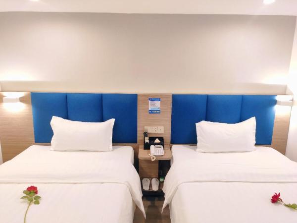 7Days Premium Shenzhen High Speed Rail North Station Minzhi Branch : photo 9 de la chambre chambre lits jumeaux supérieure