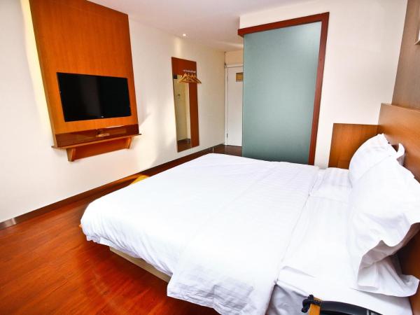 7Days Inn Xi'an Big Wild Goose Pagoda East Xiaozhao Road : photo 1 de la chambre chambre supérieure lit queen-size