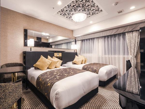 APA Hotel Shin Osaka Ekimae : photo 4 de la chambre chambre lits jumeaux de luxe - non-fumeurs