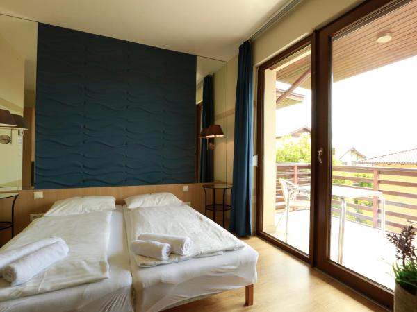 Fürjes Villa Apartmanház : photo 2 de la chambre studio avec balcon