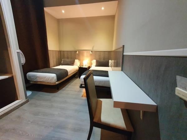 CH Plaza D'Ort Rooms IV : photo 1 de la chambre chambre lits jumeaux