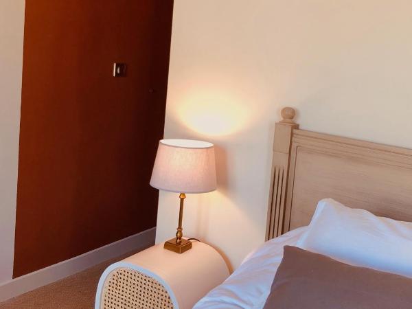 Villa Agrippa : photo 2 de la chambre chambre lit king-size - vue sur jardin