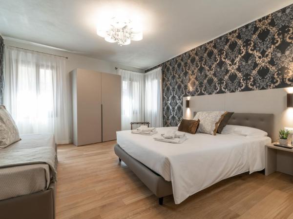 Grifoni Boutique Hotel : photo 3 de la chambre chambre triple de luxe