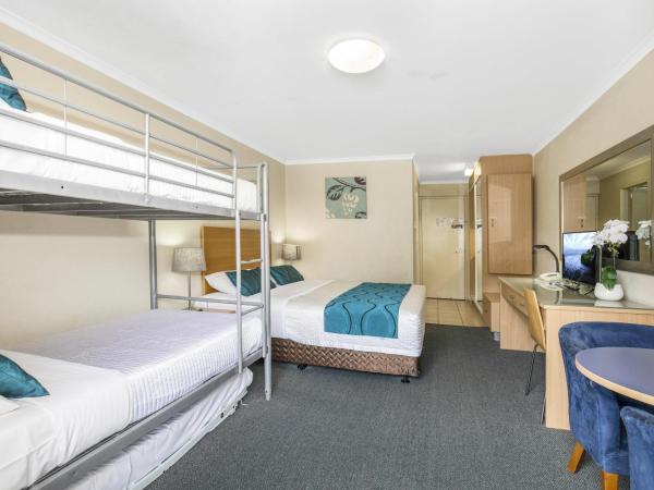 Best Western Airport 85 Motel : photo 2 de la chambre chambre standard avec 1 lit king-size et 3 lits simples