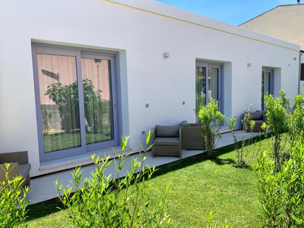 Enjoy Your Stay - Guest House - Olbia : photo 9 de la chambre chambre triple - vue sur jardin