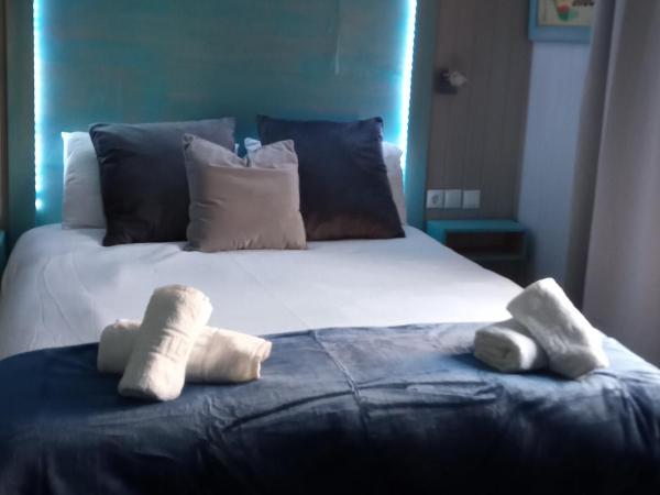 Villa Palma : photo 5 de la chambre chambre quadruple avec salle de bains