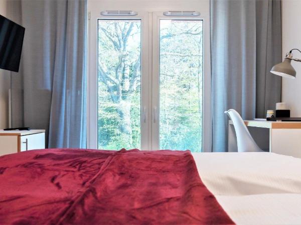 Gästehaus Hansa Residence : photo 1 de la chambre chambre double ou lits jumeaux avec douche