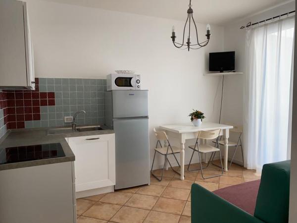 Residence Ambra : photo 1 de la chambre chambre familiale avec salle de bains