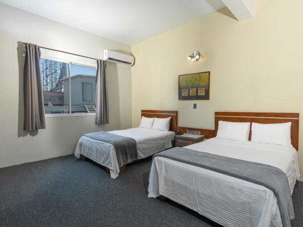 Hotel Plaza del Arco - Monterrey : photo 2 de la chambre chambre double avec 2 lits doubles