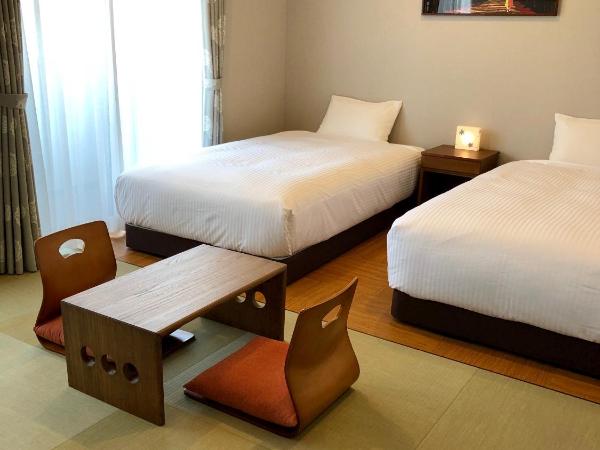 Yukari Kyoto : photo 1 de la chambre chambre lits jumeaux supérieure avec coin tatami et balcon