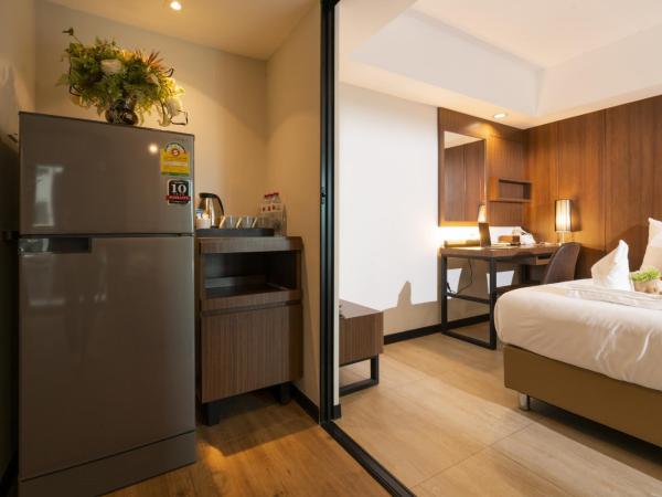 The Home Hotel SHA : photo 9 de la chambre chambre triple