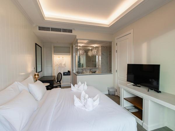 Siam Tharadol SHA Extra Plus : photo 3 de la chambre suite 2 chambres