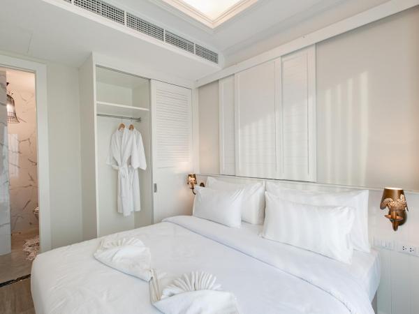 Siam Tharadol SHA Extra Plus : photo 10 de la chambre suite 2 chambres