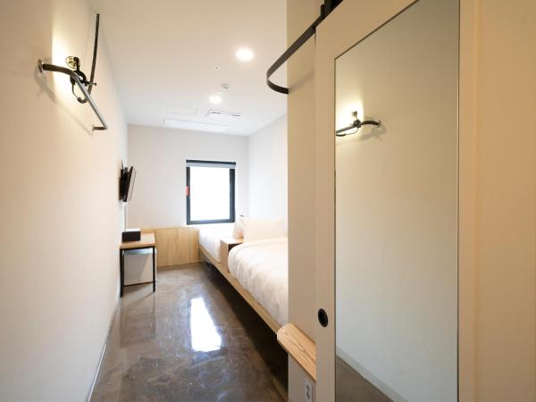 Wegoinn Hostel : photo 3 de la chambre chambre lits jumeaux standard