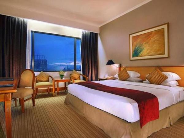 Menara Peninsula Hotel : photo 2 de la chambre chambre lits jumeaux