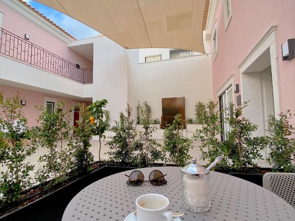 Cardeal Suites & Apartments : photo 3 de la chambre appartement - vue sur jardin