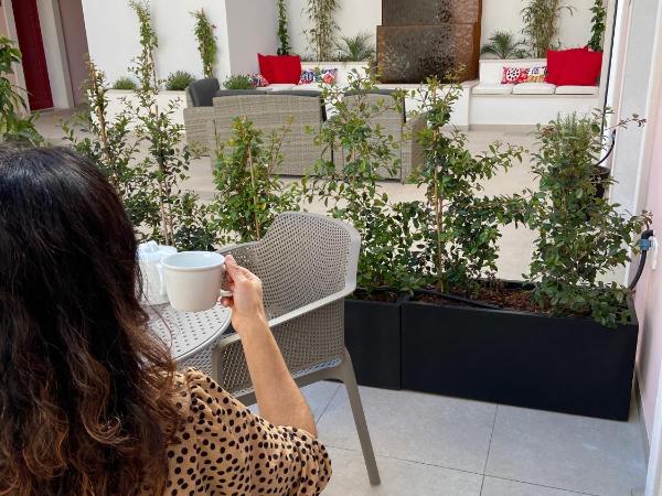 Cardeal Suites & Apartments : photo 8 de la chambre appartement - vue sur jardin