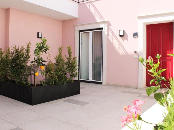 Cardeal Suites & Apartments : photo 8 de la chambre studio avec vue sur jardin