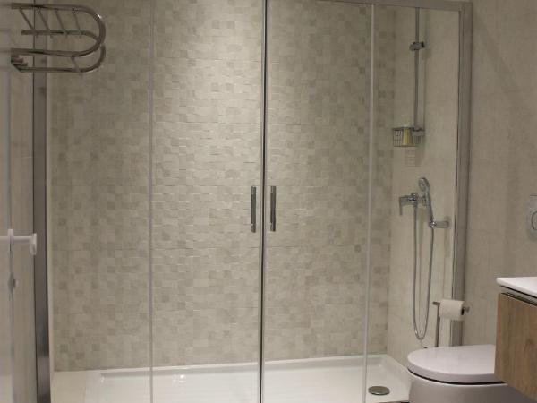 Cardeal Suites & Apartments : photo 6 de la chambre studio avec vue sur jardin